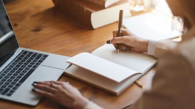 person-writing-on-white-paper-3803252-scaled-1
